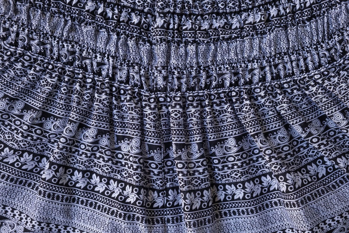 Gray rayon pants waistband with gathered elastic and bold geometric print