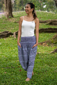 Gray printed rayon pants with gathered waistband and wide relaxed legs