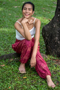 Burgundy paisley print flow pants with gathered elastic waist and ankle length